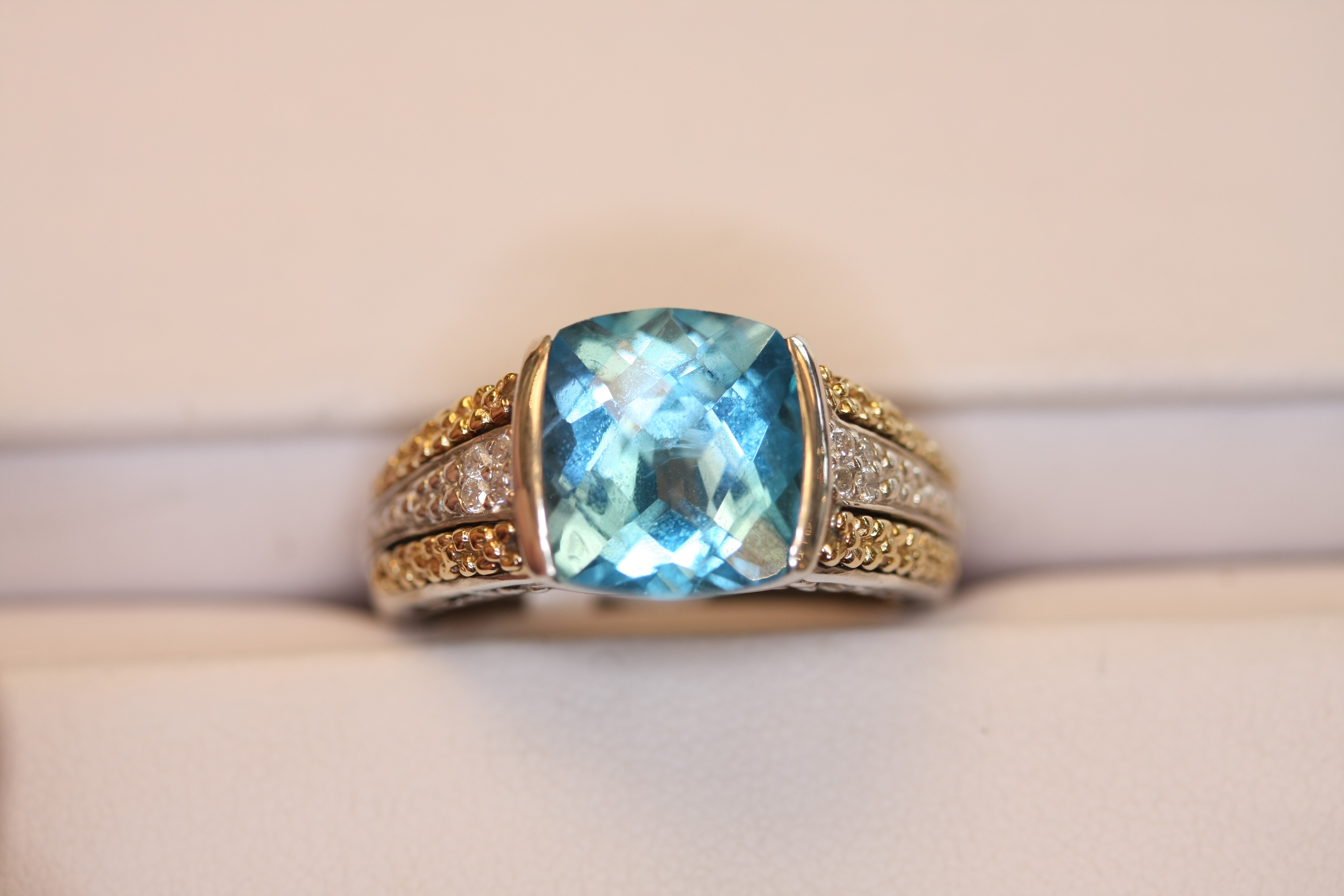 Signature Blue topaz Silver and Gold Ring