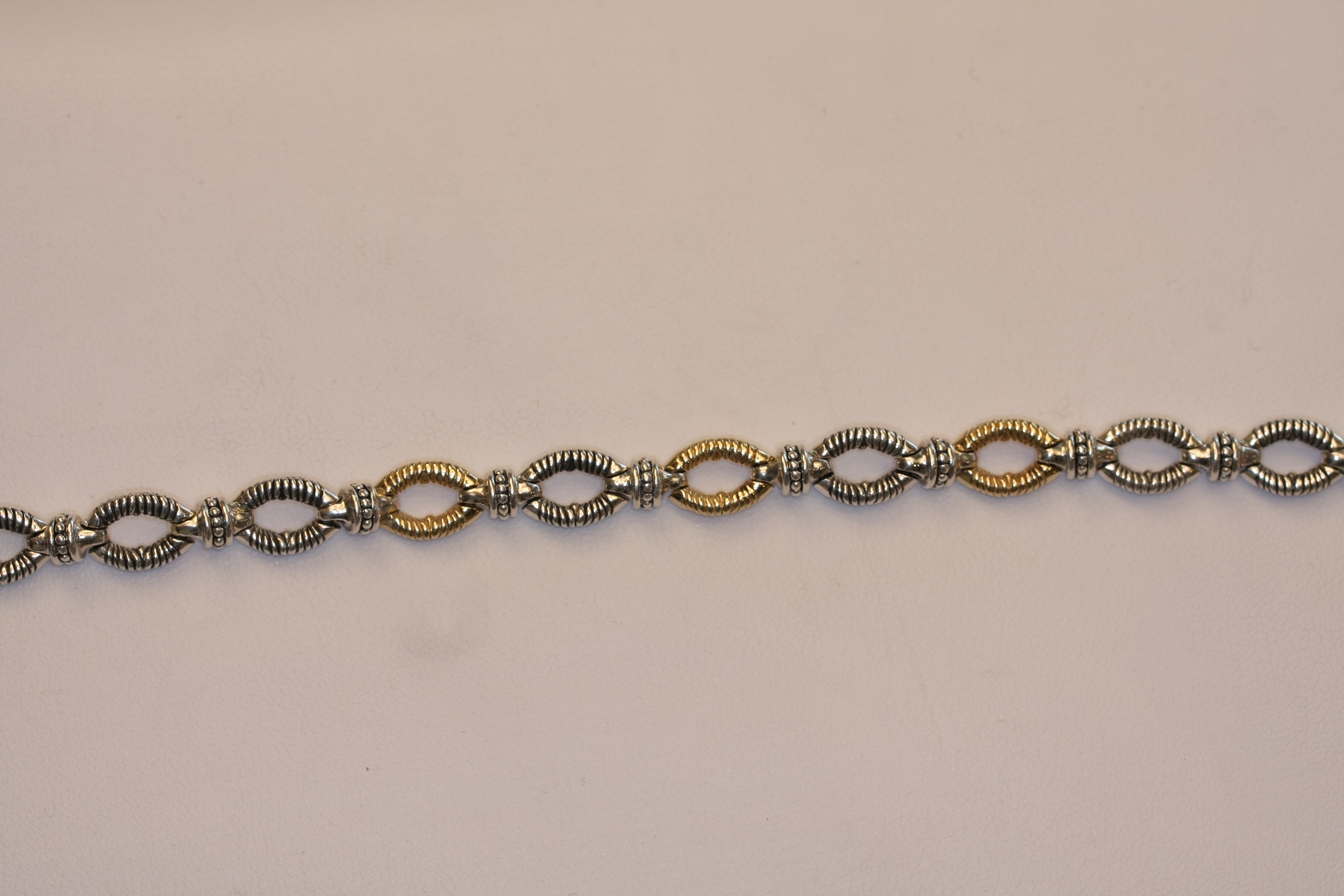 gold and silver textured link necklace